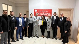 Salihli Bakkallar Esnaf Odası'nın yeni başkanı Özcan Çetin mazbatasını aldı