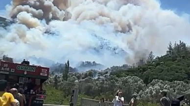 İzmir Menderes orman yangını hava desteğiyle söndürülüyor