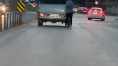 Bursada patenli genç kamyonetin arkasında yolculuk yaptı