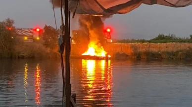 Manavgat Irmağında balıkçı teknesi alev aldı yandı