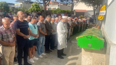 Aydın'ın Kuşadası ilçesinde bıçaklı saldırıda hayatını kaybeden taksici Vural İşçen toprağa