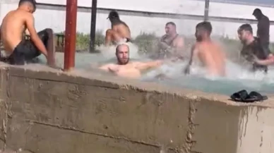 Hatay'da tarım işçileri maydanoz havuzunda serinledi