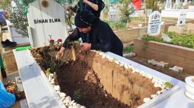 Adana'da yağışta oğlunun mezarı çöken anne gözyaşlarına boğuldu